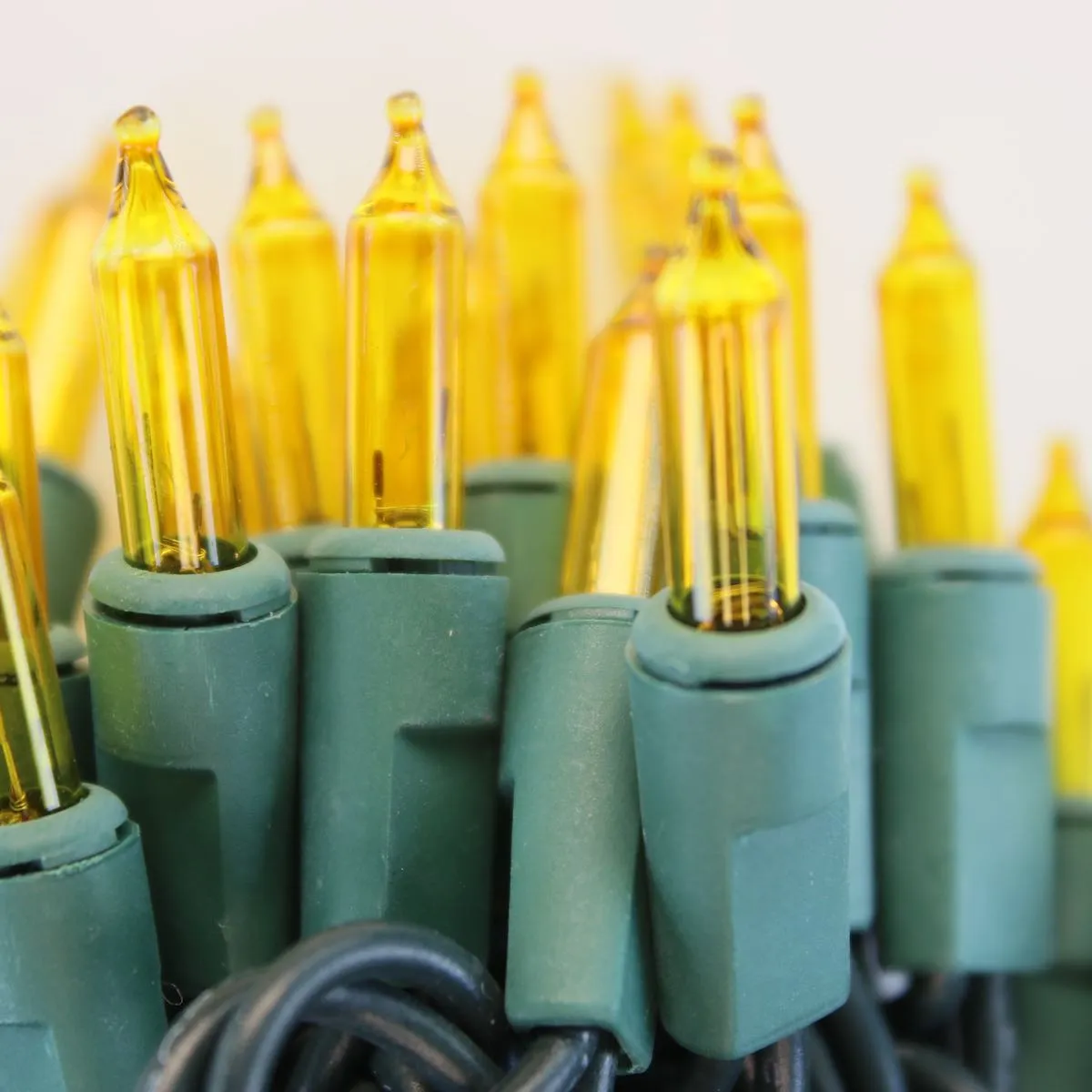 50-bulb Yellow Mini Lights, 6" Spacing, Green Wire