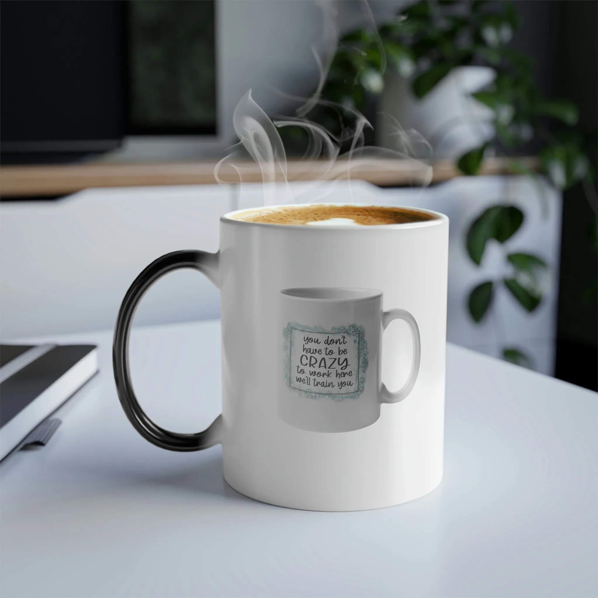 You don't have to be crazy to work here, we'll train you coffee mug on an 11oz Color Morphing Mug